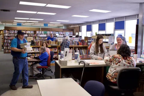 People shopping at the Friends book sale.
