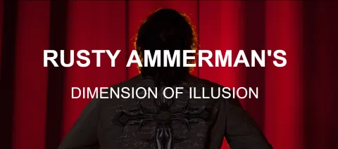 Promotional image for Rusty Ammerman's Dimension of Illusion. Person facing away and standing in front of red curtain.