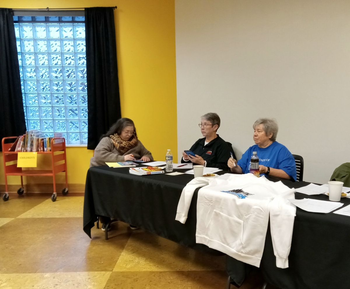 Friends volunteers conducting a past Annual Meeting.