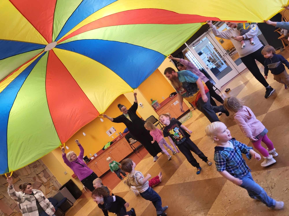 Parachute play with children