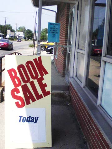 Book Sale sign shown outside the Friends Building at 1110 W. Memorial Drive, Muncie, IN. 
