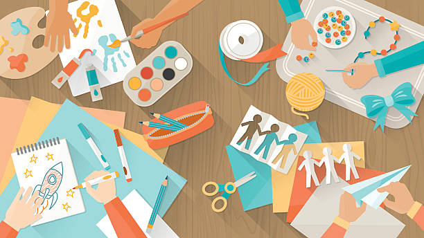 clip art of a table full of craft supplies.