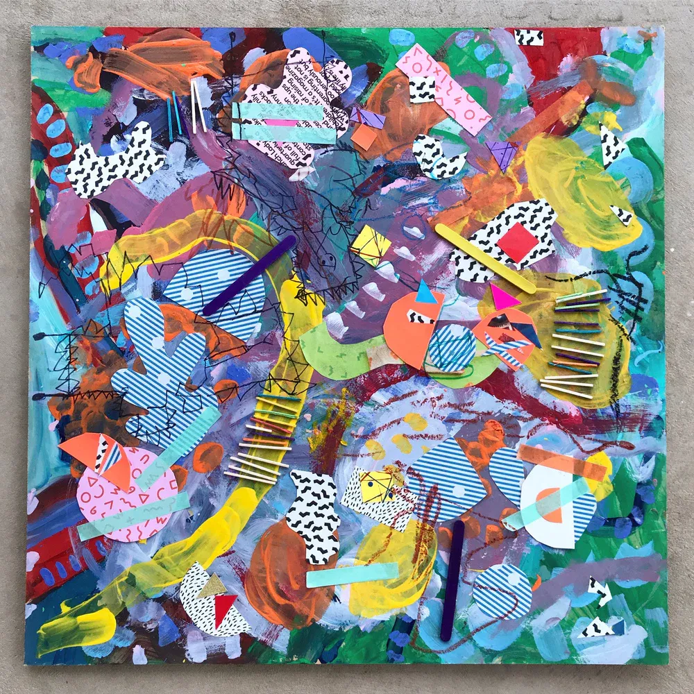 mixed media art using paint and various colors of paper